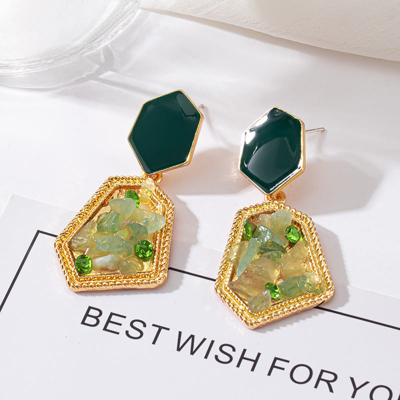 Luksus øreringe med grønne krystaller i guld