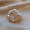 Vintage Sommerfuglebroche med perler og Diamanter i Guld