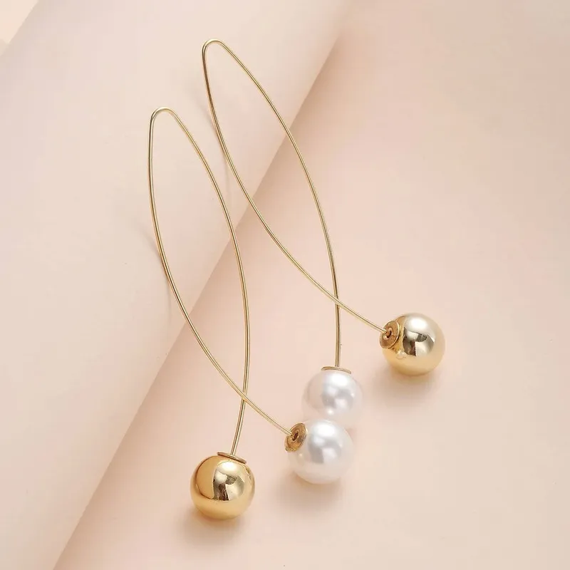 Vintage-øreringe i guld og perler