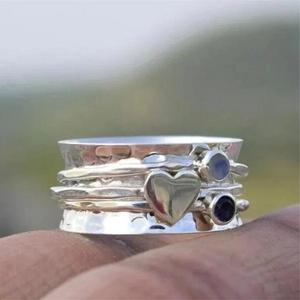 Roterende hjerte-ring i sølv