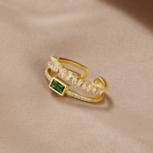 Justerbar ring med gyldengrøn krystal