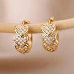 Hjerte øreringe med zirkonia i guld og sølv