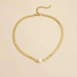 Græsk halskæde med perle i guld