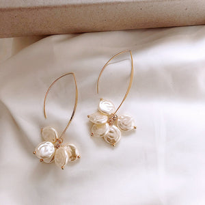 Elegante øreringe med perle og krystal