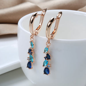 Elegant blå og guld krystal øreringe