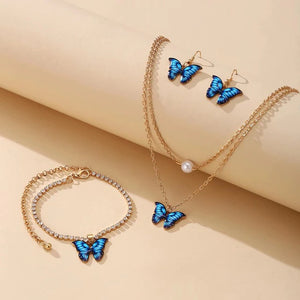 Smykkesæt med sommerfugl i guld